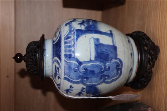 A Chinese Ming blue and white jar, Wanli period, hare mark, with hardwood stand and cover height excl. stand and cover 17cm